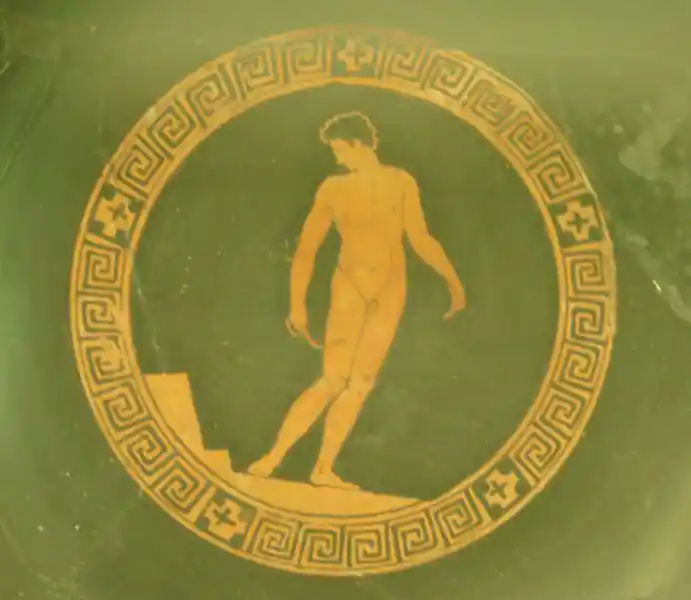 Young man cleansing himself with strigil by Beazley, "Painter of Eretria". about 425 BC.